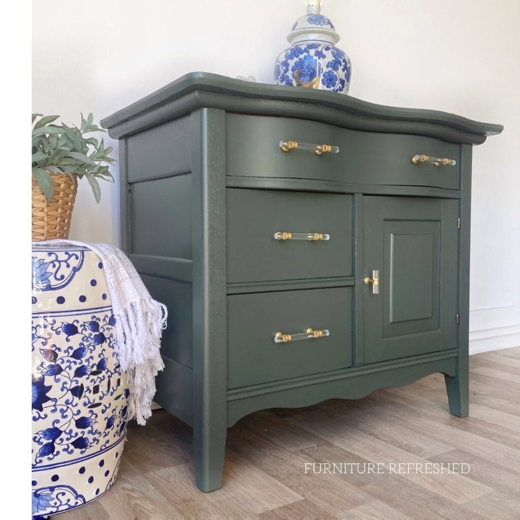 Full photo of green washstand that has drawers with Knapp joints.