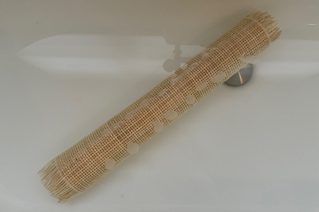 Cane webbing soaking in water