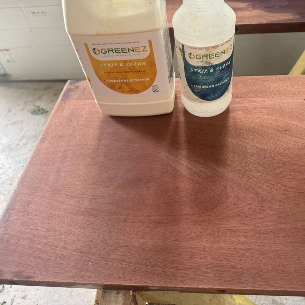 photo of the table top after being stripped with GreenEZ and cleaned. The majority of the existing finish has been removed.