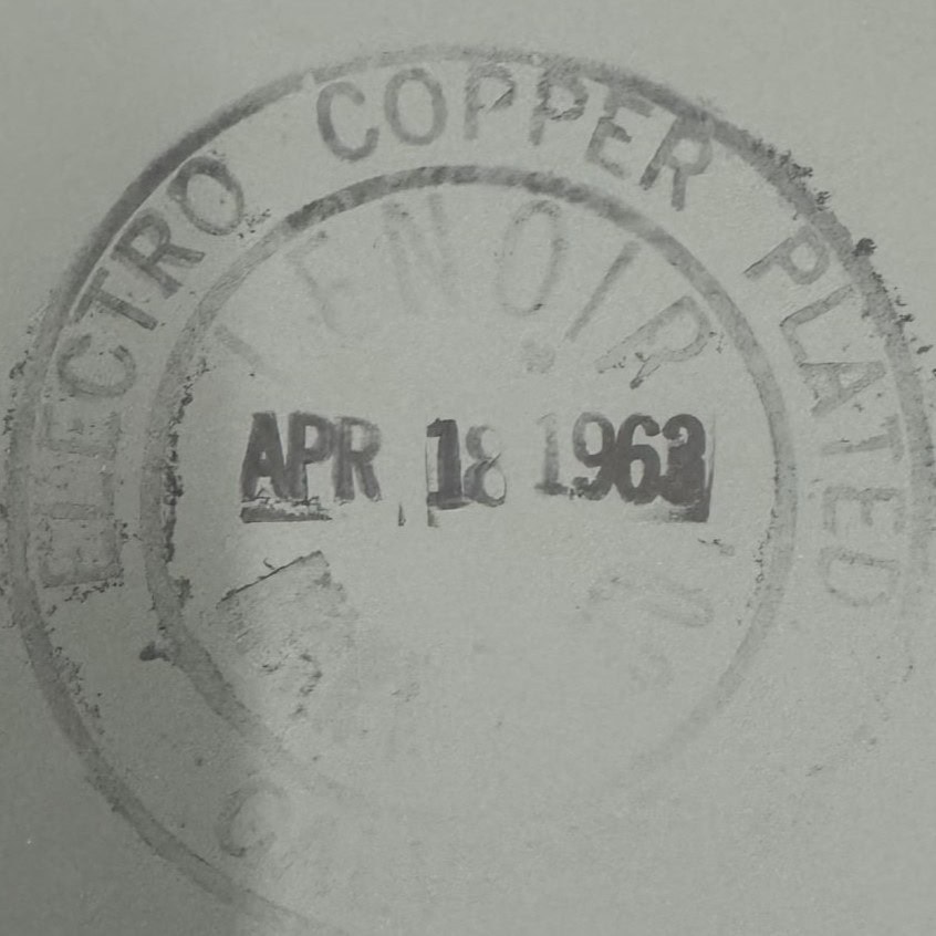 Date stamped on the back of a vintage mirror. Read April 18, 1963.