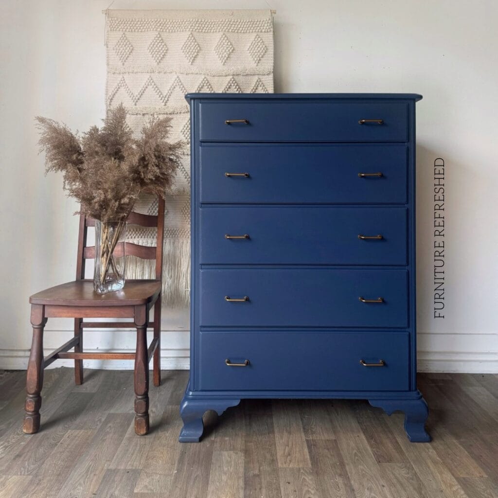 After photo of navy tallboy dresser