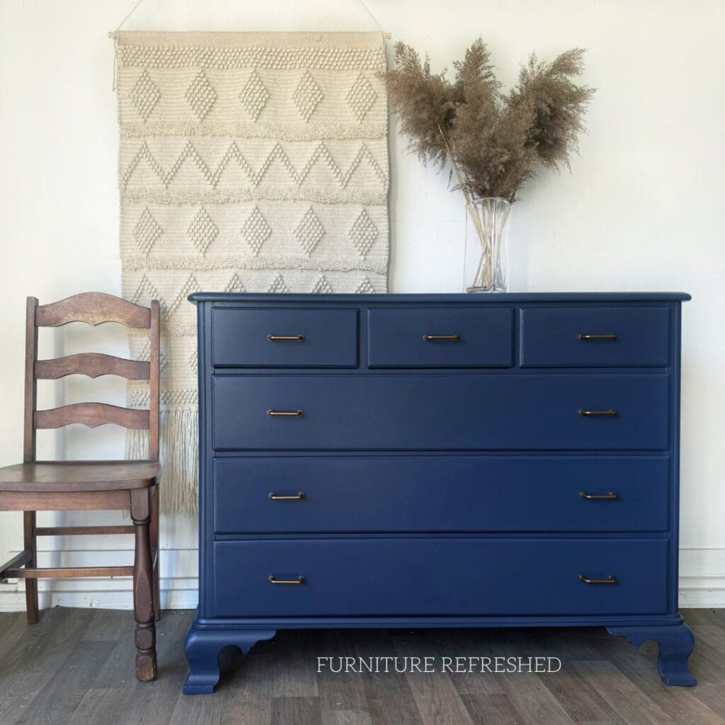 After photo of 4 navy lowboy dresser.