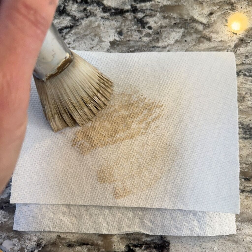 Dry brushing tecnique - removing extra paint from your brush.