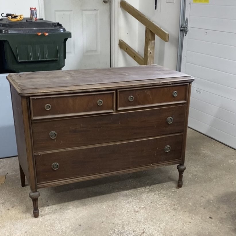 Before photo of dresser that needed the veneer removed from the top.