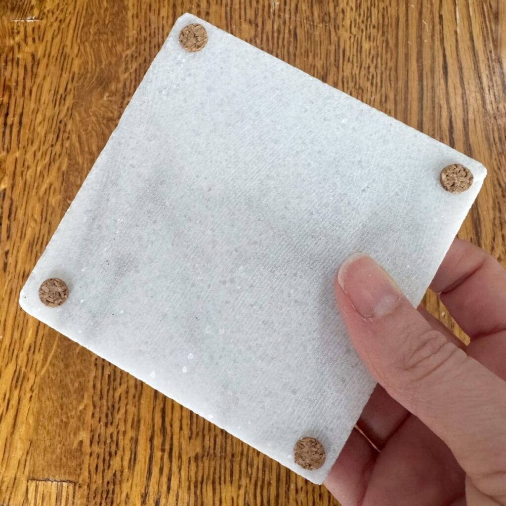 The back of the tile coaster with cork added for protection.