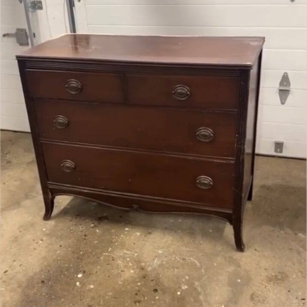 before photo of lowboy stained brown dresser.